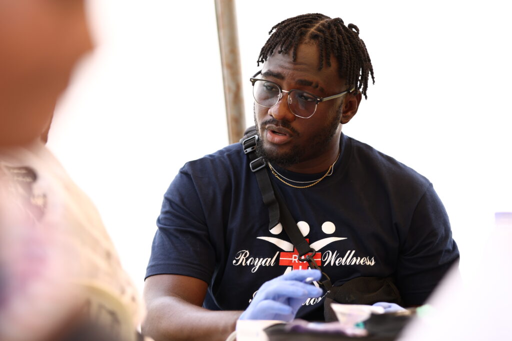 Patients receiving care at a medical outreach